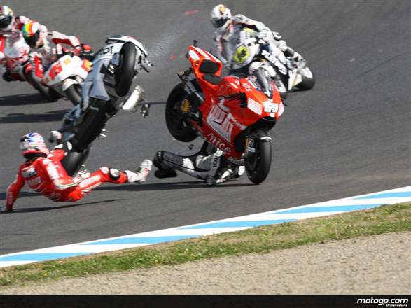 Nicky Hayden And Hiroshi Aoyama Crash Here At A Motogp